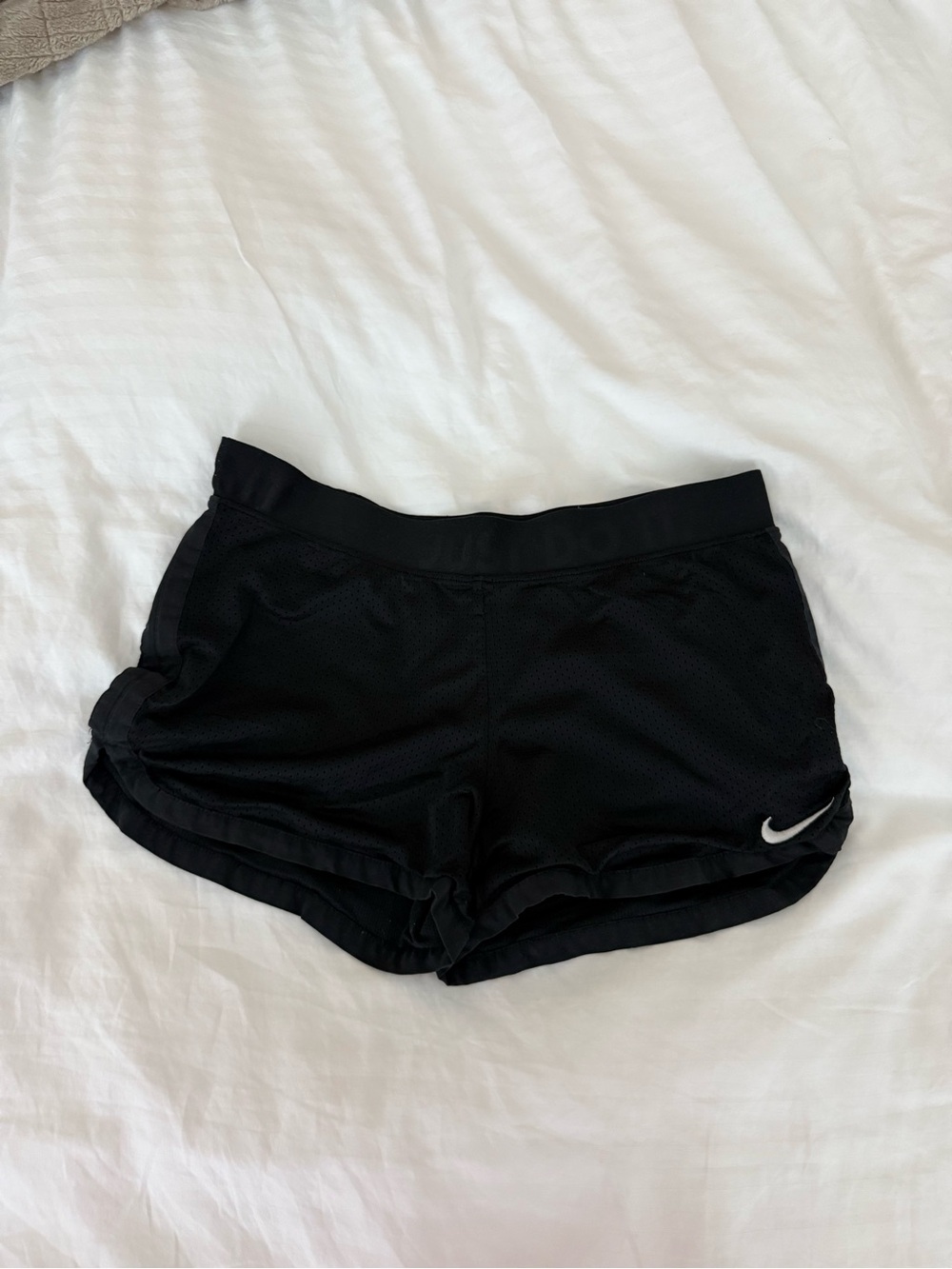 Nike Black Women's Athletic Mesh Shorts with White Swoosh
